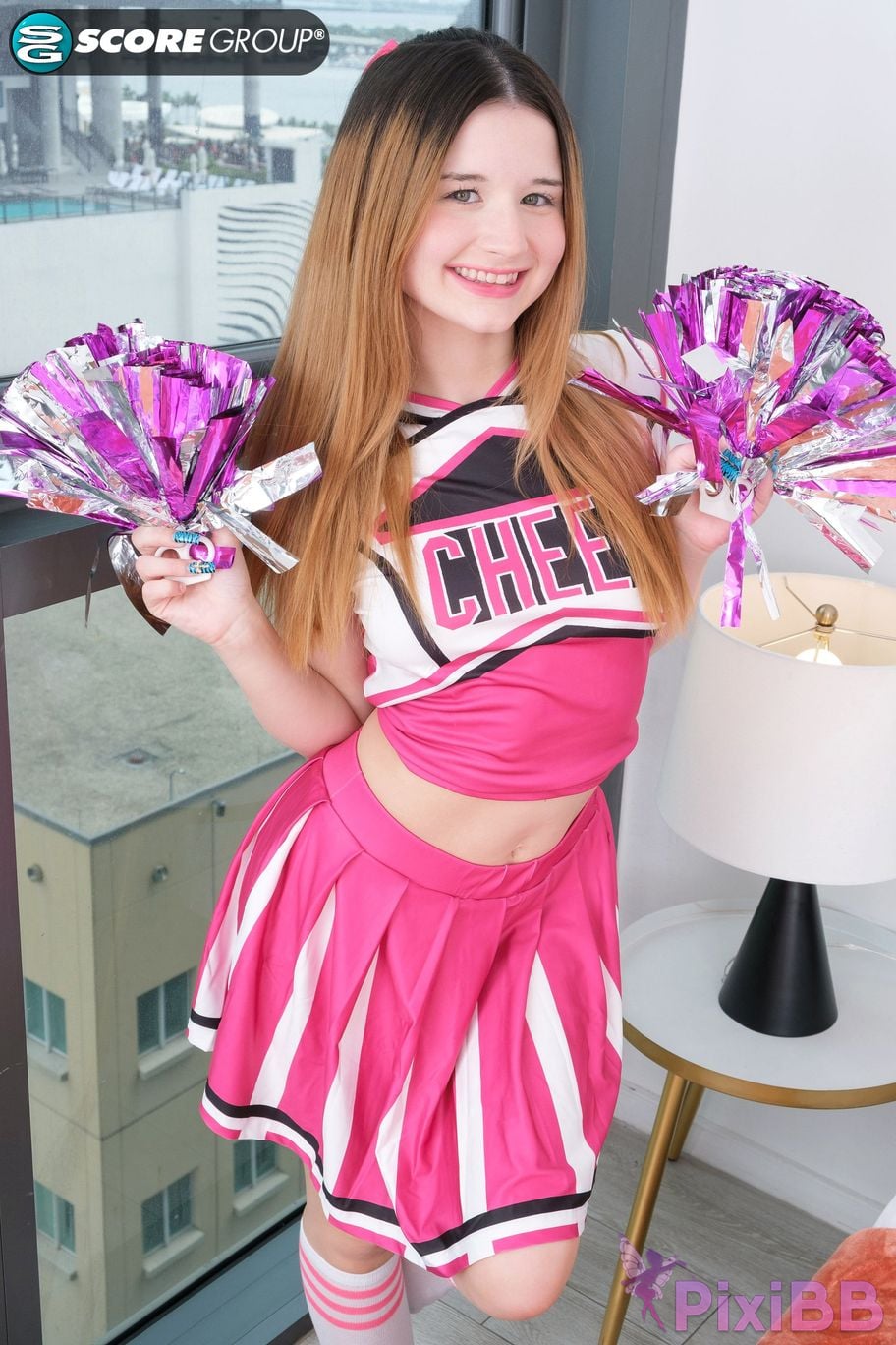 18eighteen cheerleader carly kiss shows off her flexible 010 PixiBB.COM